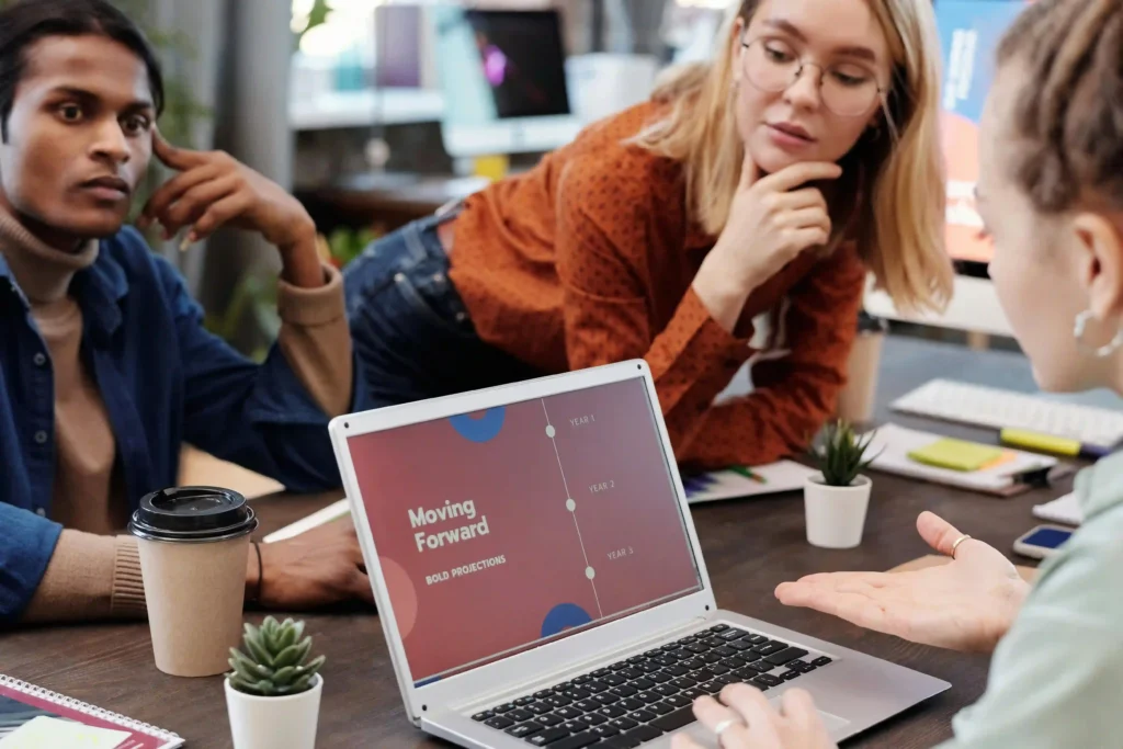 Team at a social media ad agency in Bangalore presenting "Moving Forward".